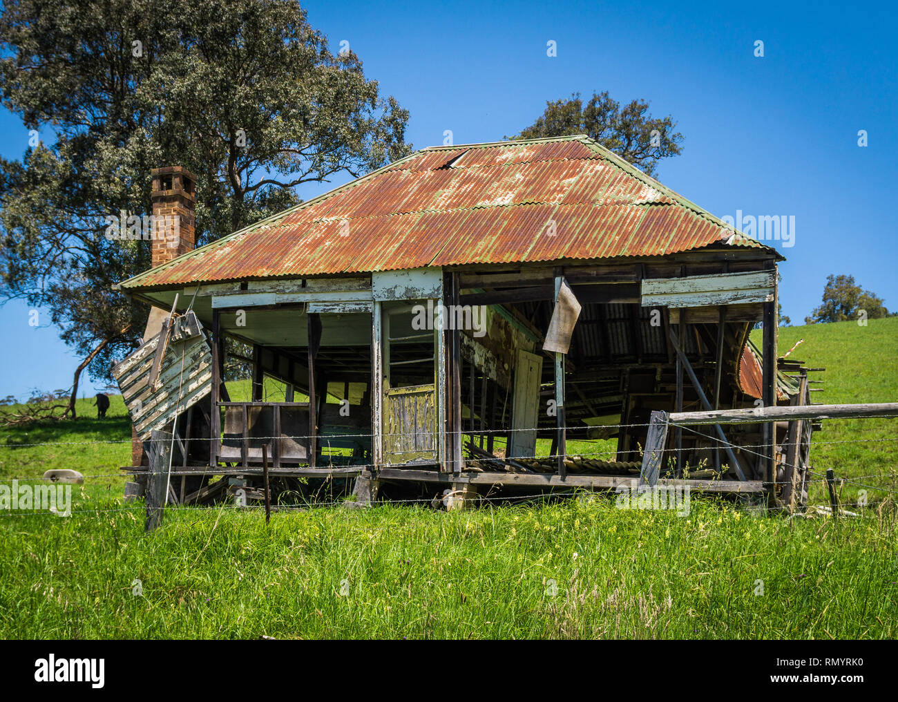 A broken-down house in the countyside Stock Photo