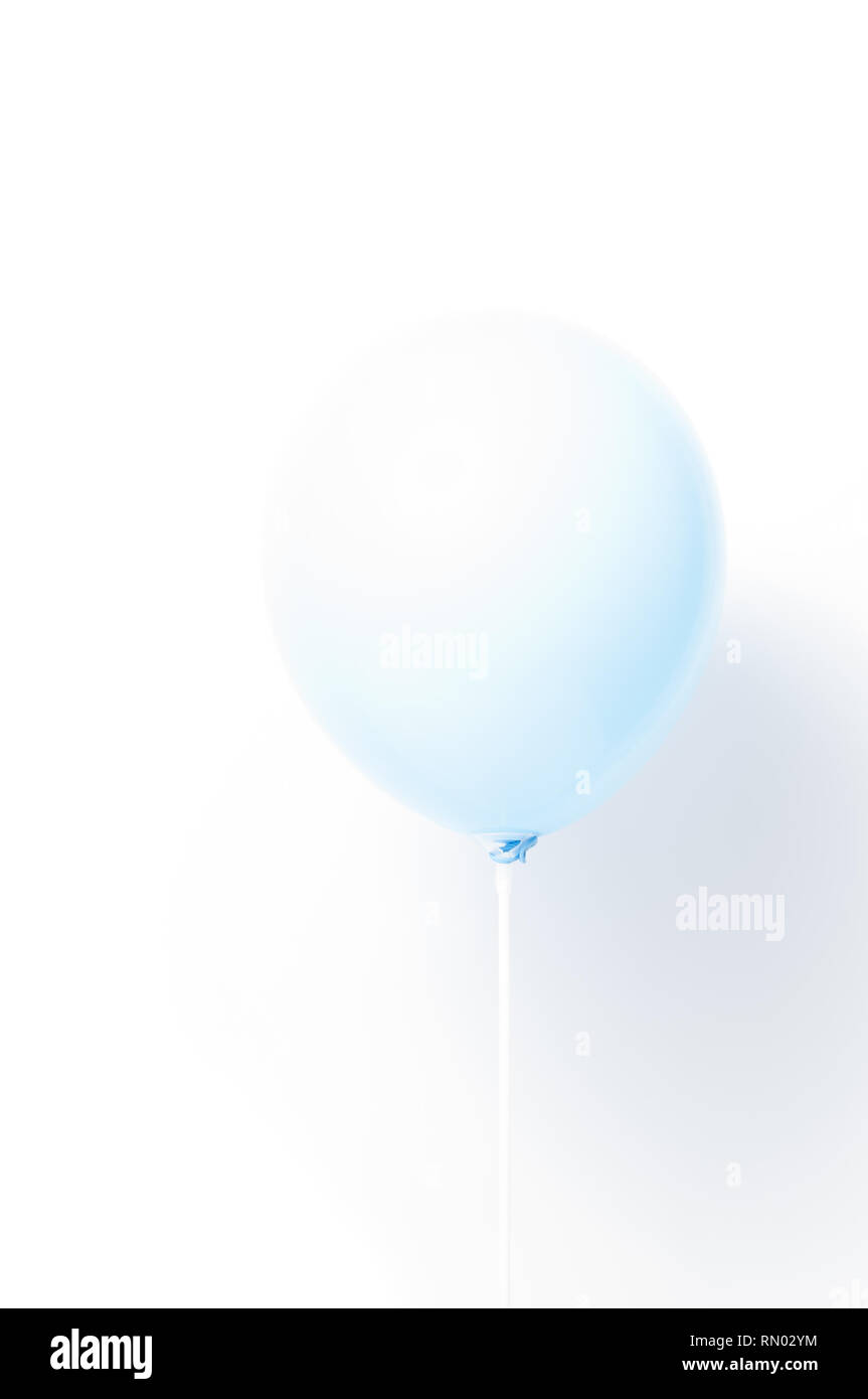 Blue balloon on white background with shadow. Strong light Stock Photo