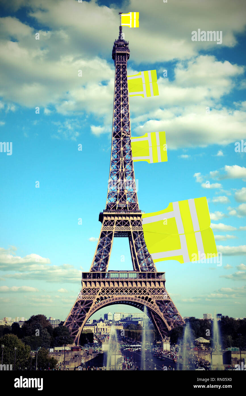 Big flag like a jackets symbol of Yellow vests movement on Eiffel Tower in  Paris seen from the Trocadero and old toned effect Stock Photo - Alamy