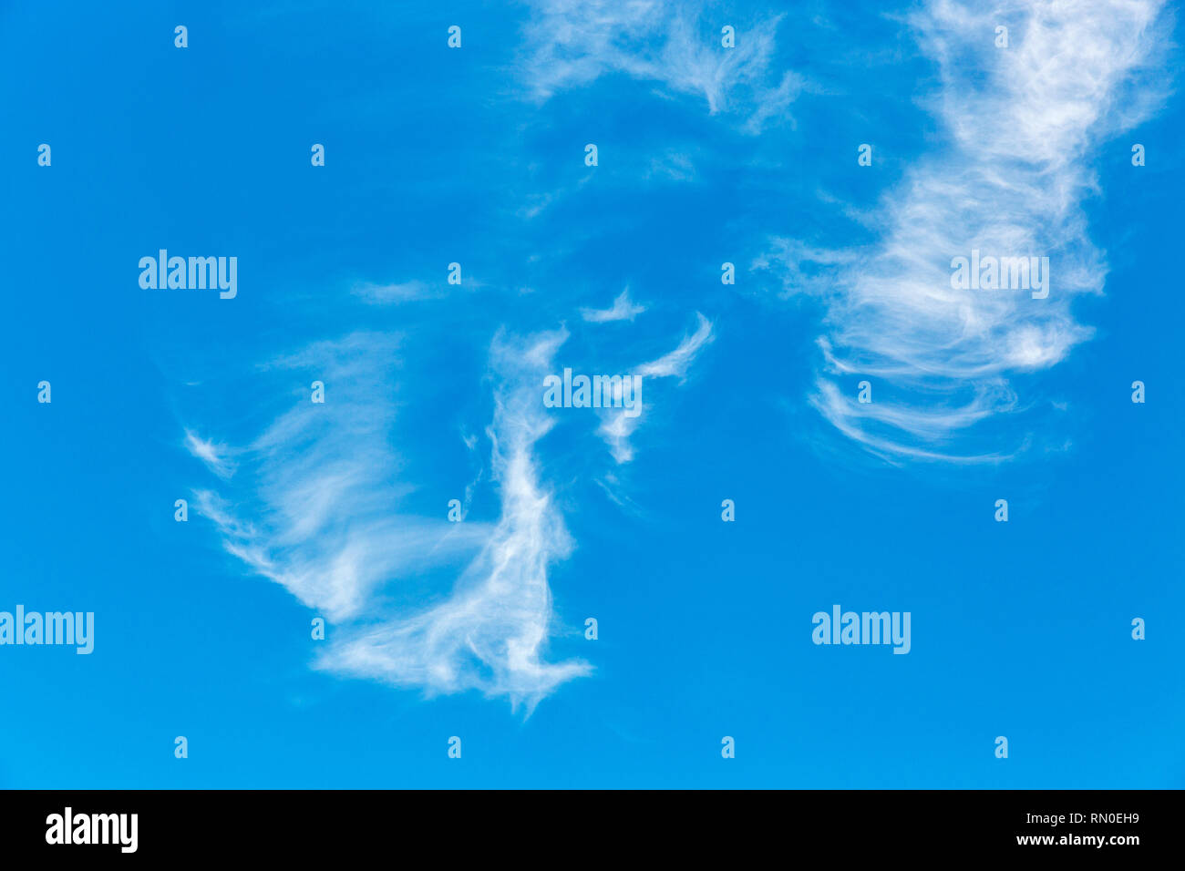 blue sky and fluffy clouds background Stock Photo - Alamy