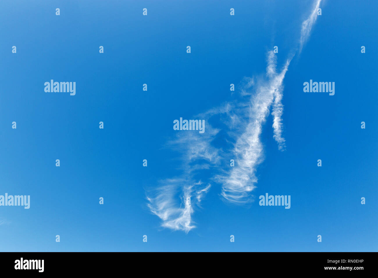 blue sky and fluffy clouds background Stock Photo - Alamy