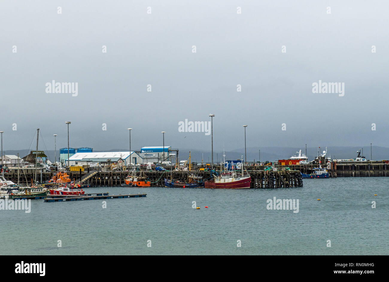 Mallaig Harbour on the north west coast of Scotland on an overcast winter day. Stock Photo