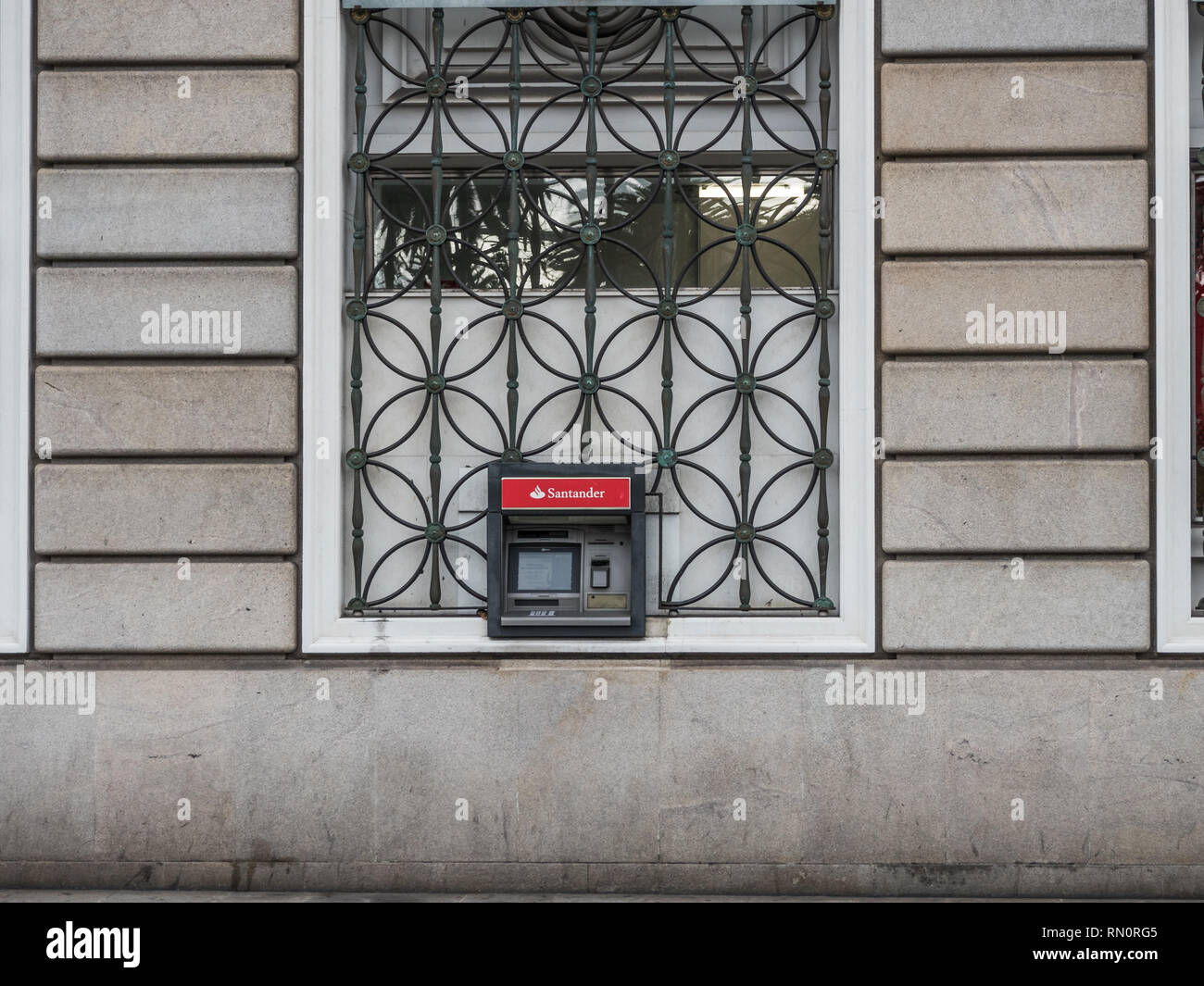 A Coruna, Spain - February 5, 2019 - ATM of Santander bank in the street Stock Photo