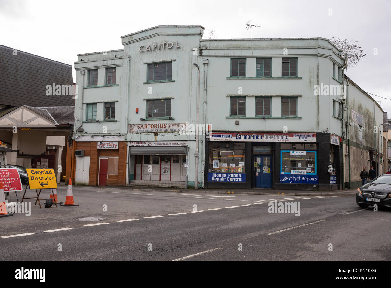 The Capitol building in Carmarthen town center in West Wales.  Once a glorious building hosting Bingo, this building is now forgotten and falling dere Stock Photo