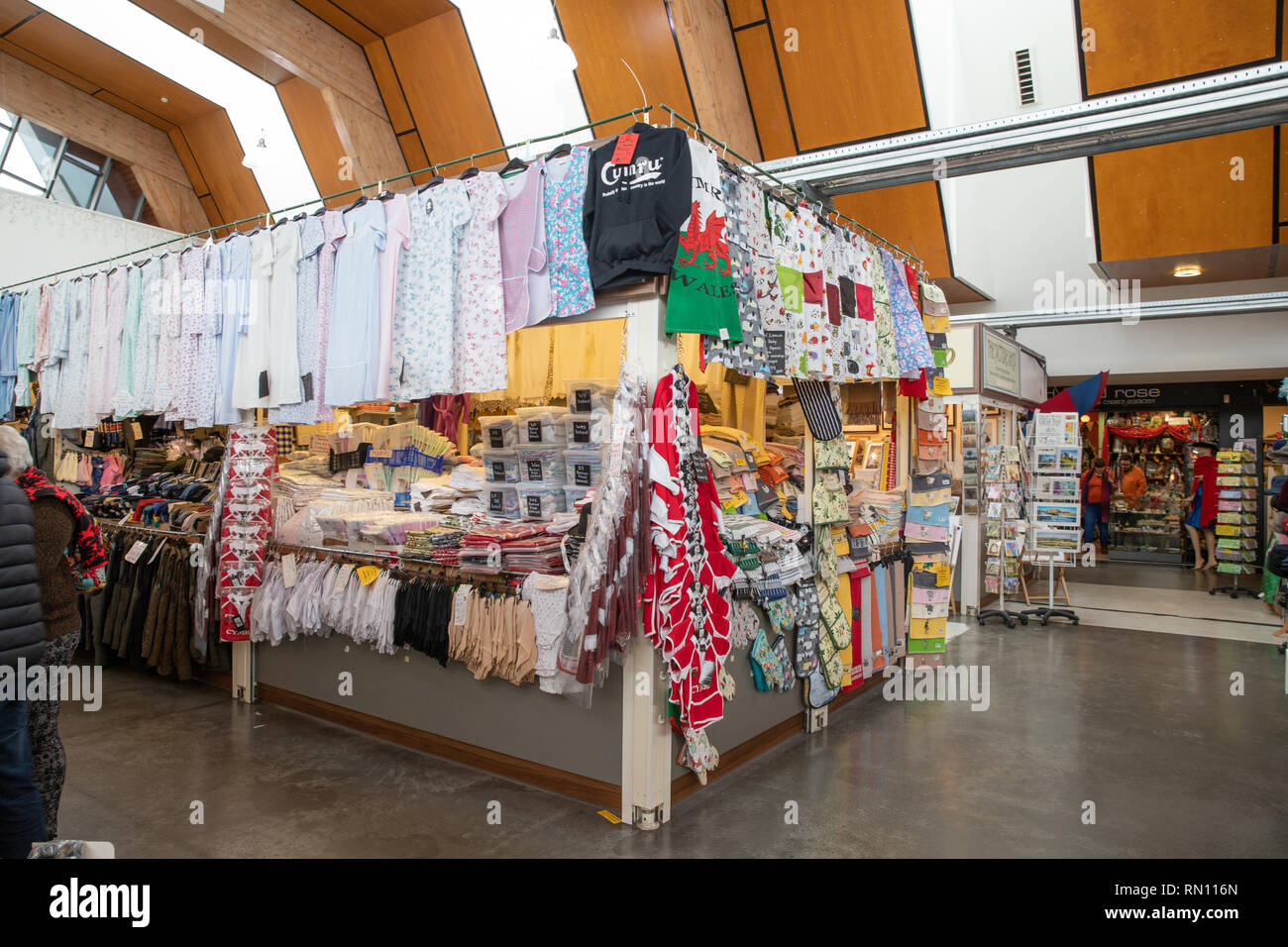Goods for sale at the Carmarthen Indoor Market, where small local businesses have stalls to sell direct to the general public Stock Photo