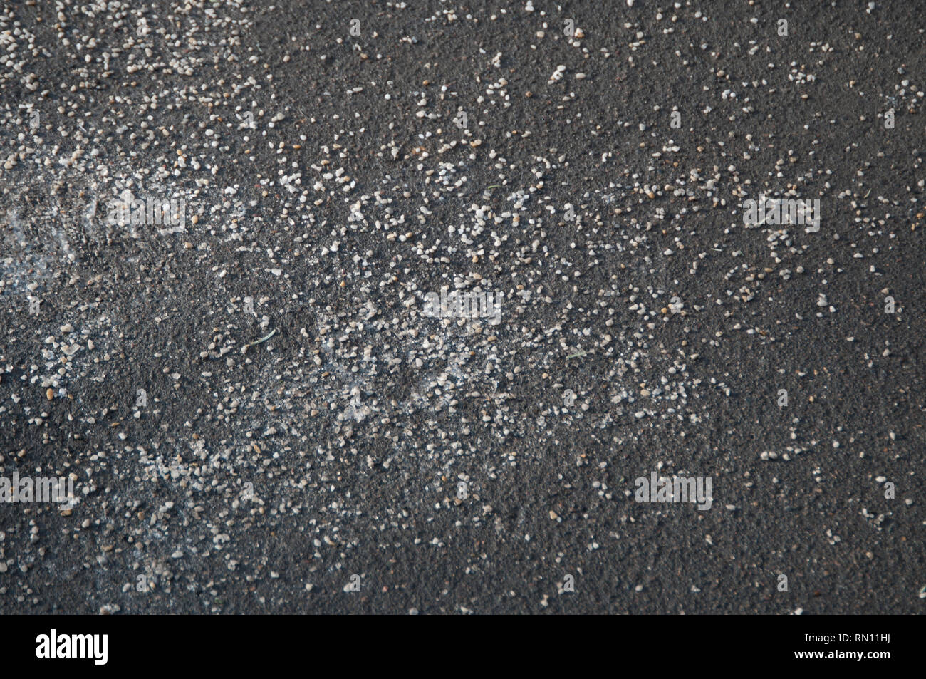 Deicing chemicals on asphalt road in Moscow Stock Photo Alamy