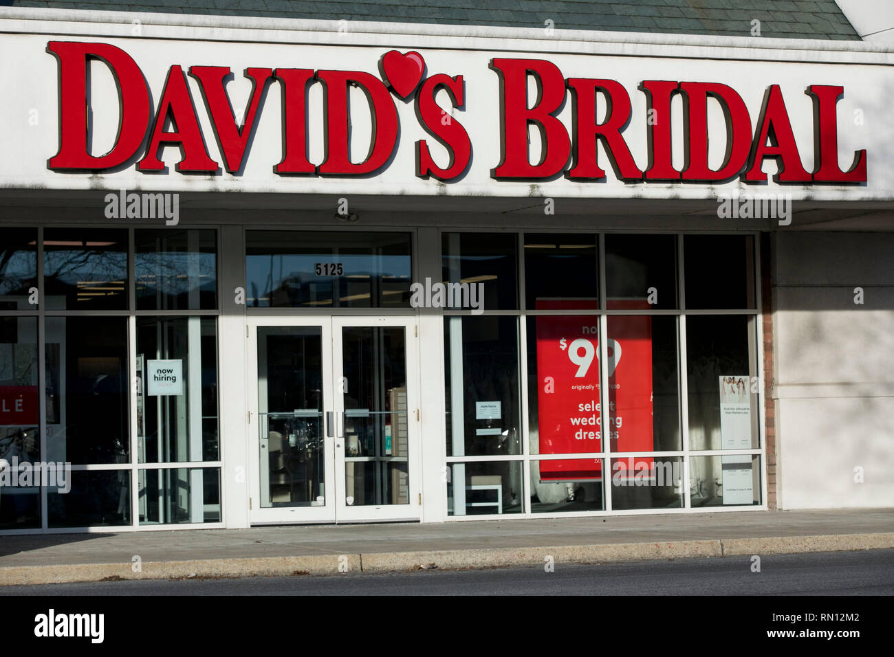 A logo sign outside of a David's Bridal retail store location in Harrisburg, Pennsylvania on February 9, 2019. Stock Photo