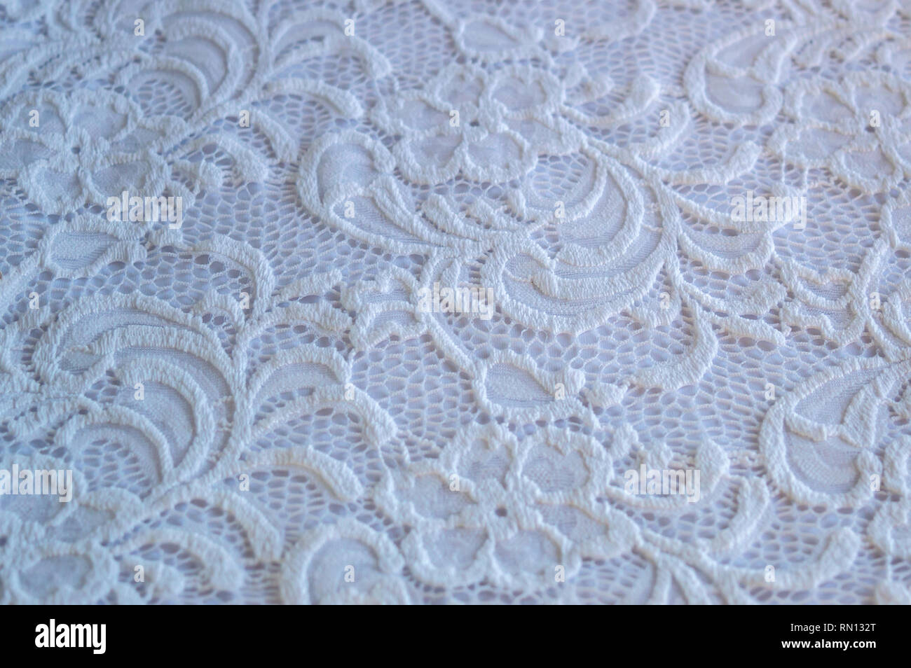 A lace wedding dress makes a beautiful background or texture pattern. Stock Photo