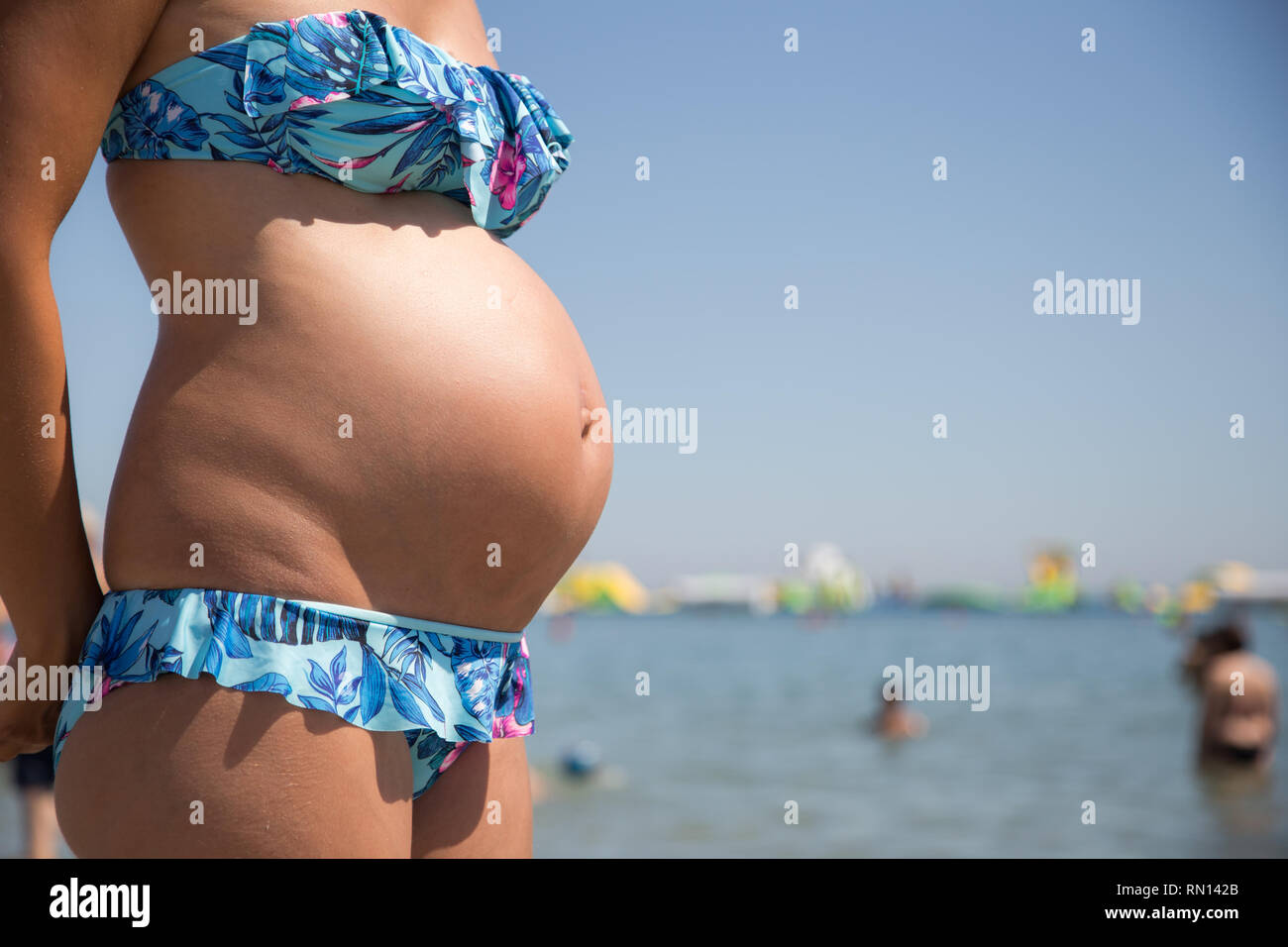 Pregnant bellies a bikini