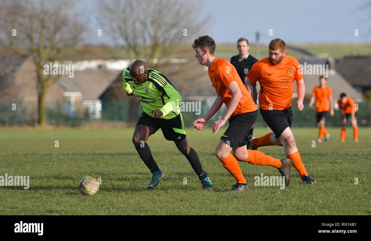 Football Action From An Amateur Match Between Faifield Fc And Hathersage Fc In The Hope Valley Amateur League Stock Photo Alamy