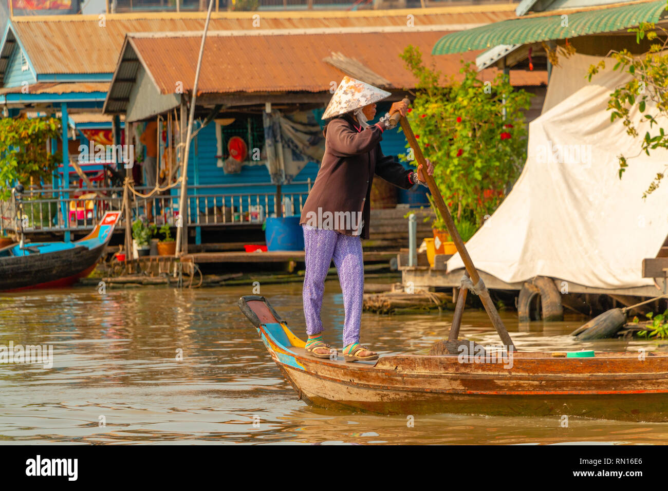 Boats are the only form of transport for families living in  floating villages on Tonle Sap River, Kampong Chhnang, Mekong Delta, Cambodia, Asia Stock Photo