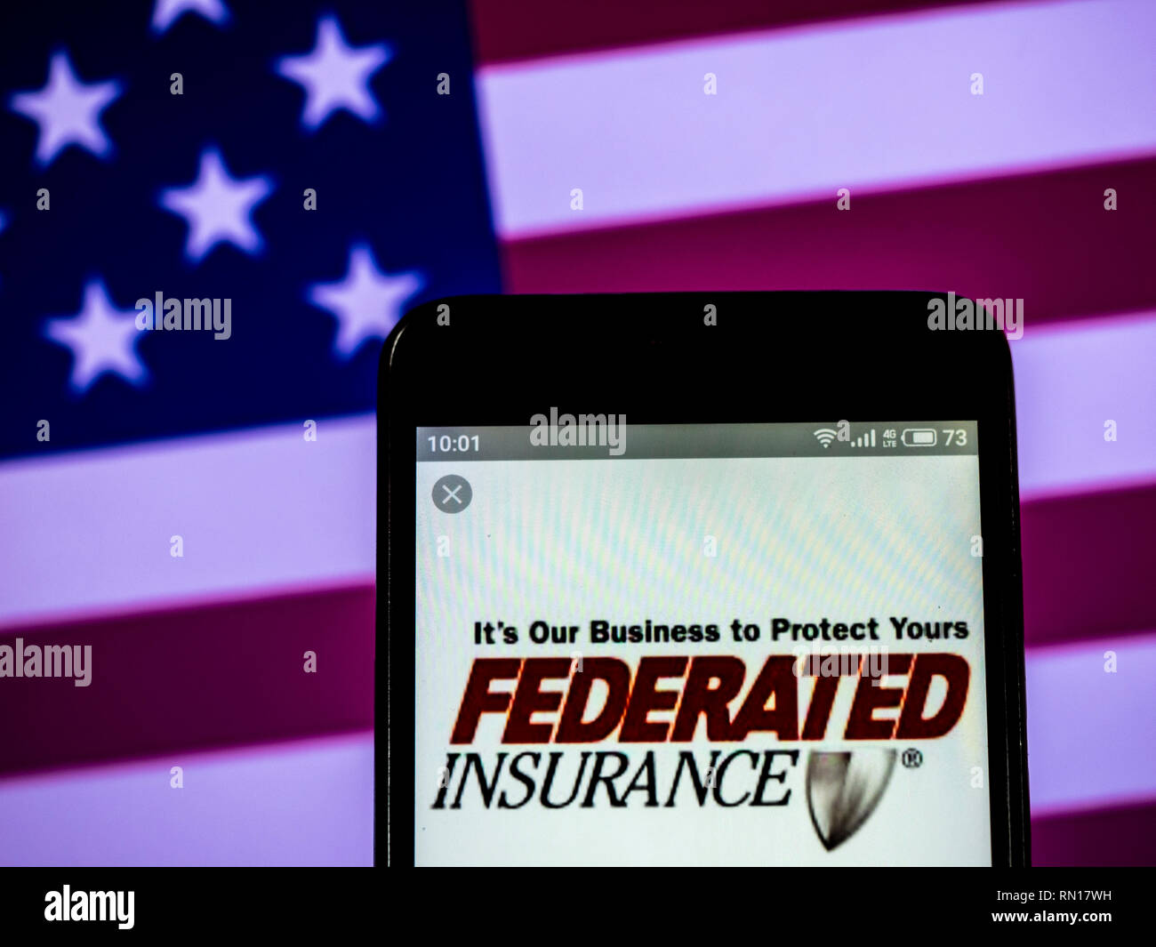 Federated Mutual Insurance Company logo seen displayed on smart phone