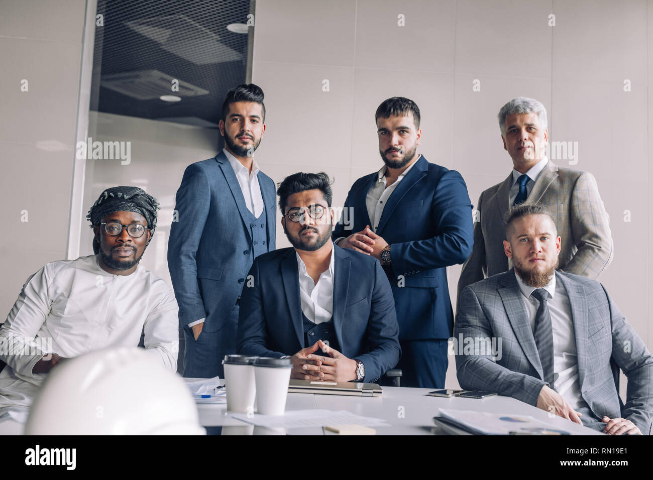 Indian man standing confidently hi-res stock photography and images - Alamy