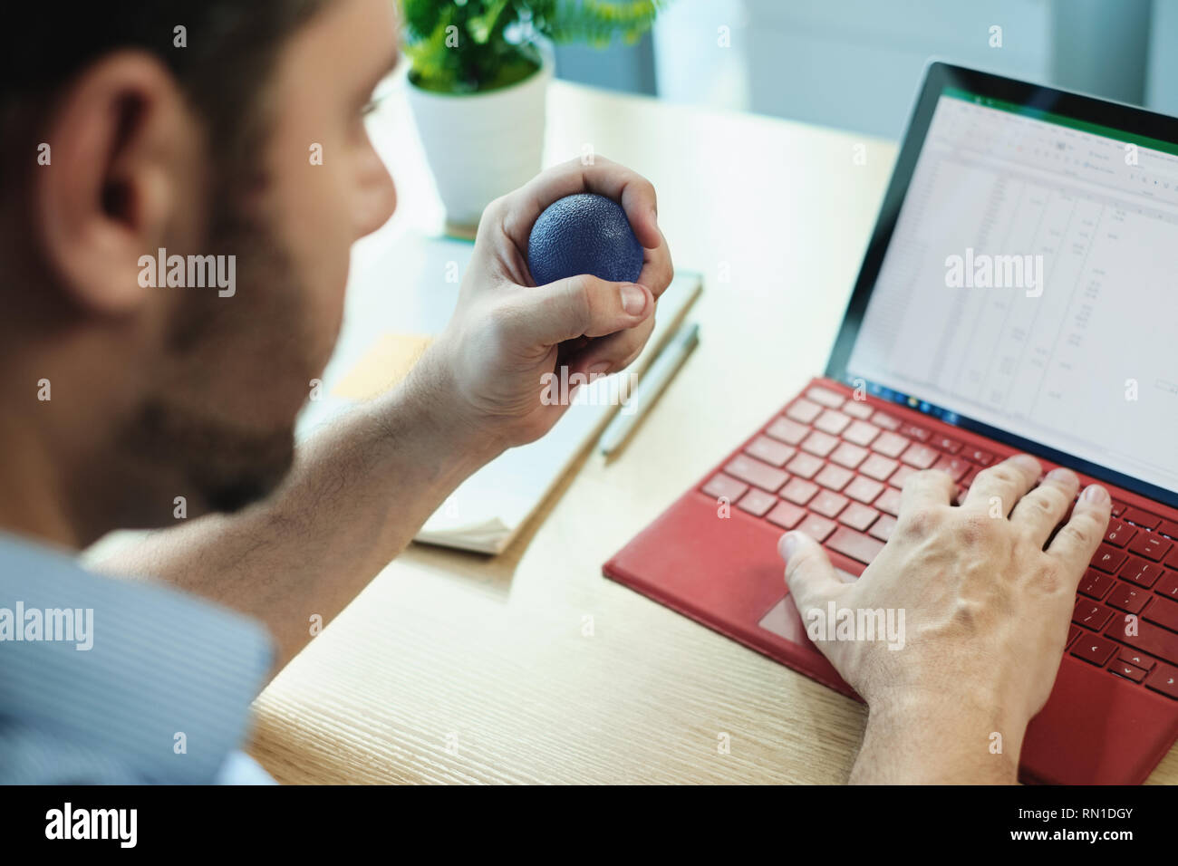 Adult Business Man Under Stress Pressure In Office Using Laptop Stock Photo