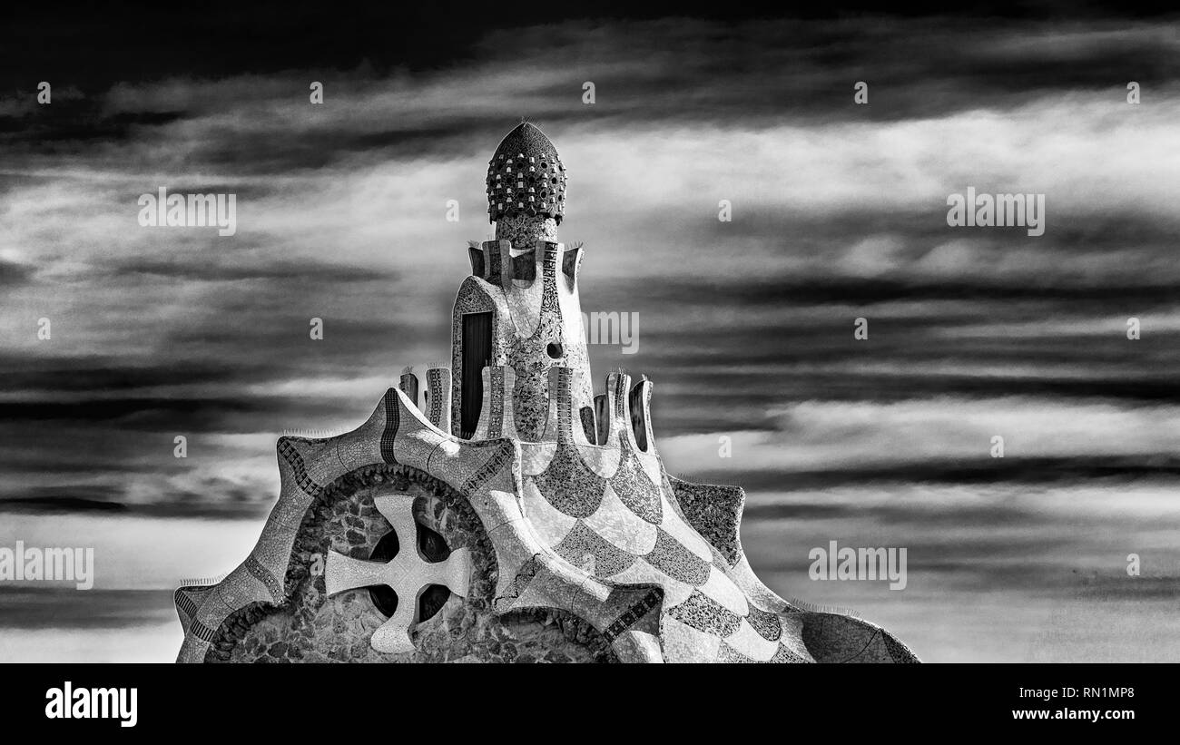 Parc Guell entrance pavilion highlighting the architecture and tiles - Stock Image