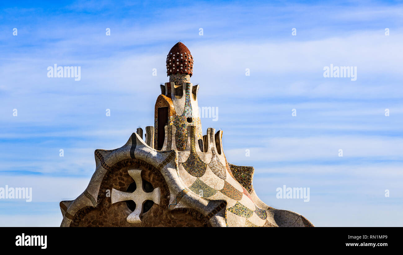 Parc Guell entrance pavilion highlighting the architecture and tiles - Stock Image