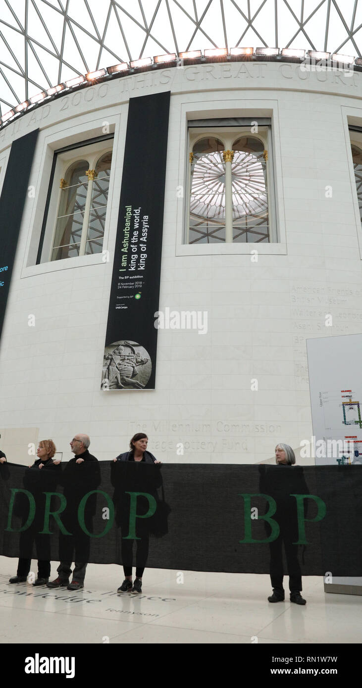 British Museum, London, UK, 16th Feb 2019. 'BP or Not  BP - No War No Warming' protest, asking the British Museum to 'Drop BP' as a sponsor. Hundreds of protesters from 'BP or Not BP' have formed human chains with messages and later stage a sit in to protest against BP sponsoring the exhibition ' I am Ashurbanipal' at the museum. Protesters rally both within the British Museum Great Hall and outside the exhibition entrance. Stock Photo