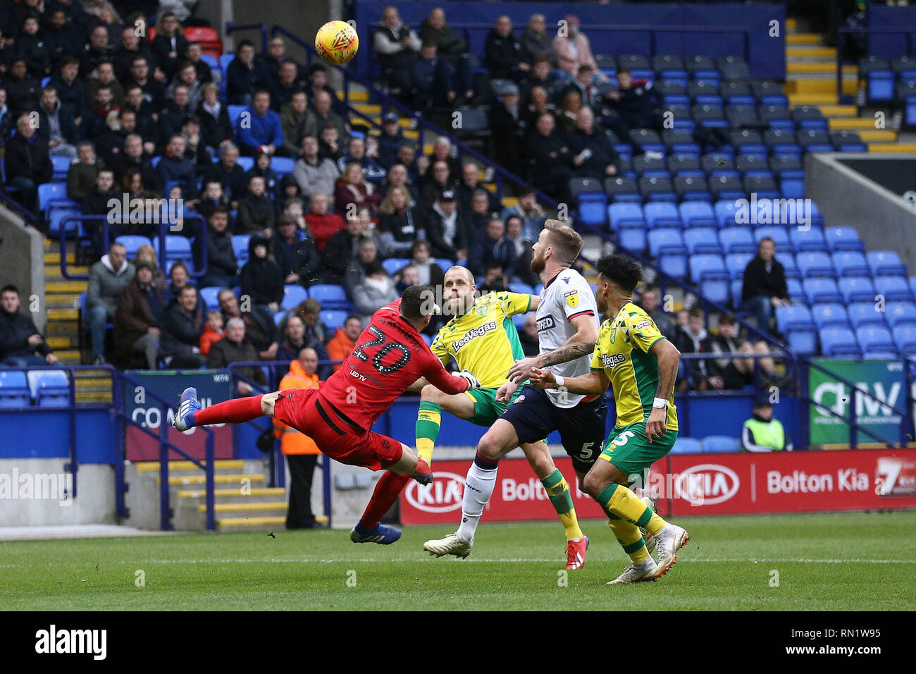 Bolton, UK. 16th February 2019. Teemu Pukki of Norwich City lobs the keeper to scores his teams 4th goal. EFL Skybet championship match, Bolton Wanderers v Norwich city at the University of Bolton Stadium in Bolton, Lancs on Saturday 16th February 2019.  this image may only be used for Editorial purposes. Editorial use only, license required for commercial use. No use in betting, games or a single club/league/player publications. pic by Chris Stading/Andrew Orchard sports photography/Alamy Live news Credit: Andrew Orchard sports photography/Alamy Live News Stock Photo