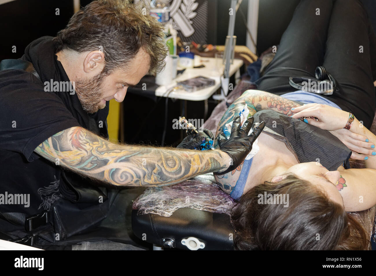 Paris, France. 15th Feb, 2019. Tattoo artist, Dalmiro during the 9th edition of the Mondial du Tatouage (World Tattoo) on February 15, 2019 at the Grande Halle de la Villette in Paris, France. Credit: Bernard Menigault/Alamy Live News Stock Photo