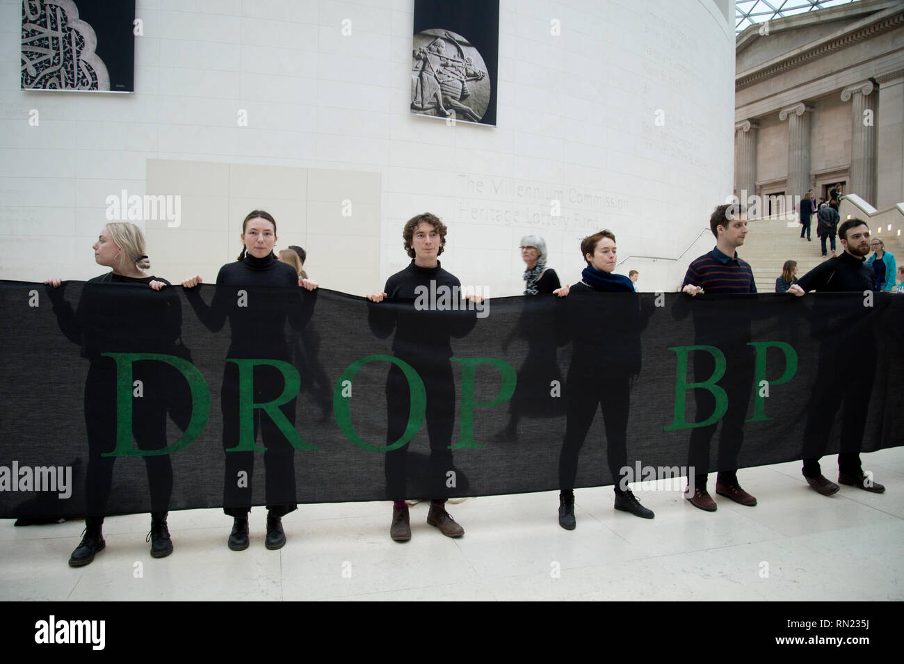 British Museum, London February 16th 2019. Over 300 people staged a creative takeover of the Great Court protesting at BP sponsorship of the current major exhibition 'I am Ashurbanipal' which features artifacts which were removed from present day Iraq during the Ottoman Empire. BP lobbied the UK government to gain access to Iraq’s oil reserves before the 2003 Iraq war. Stock Photo