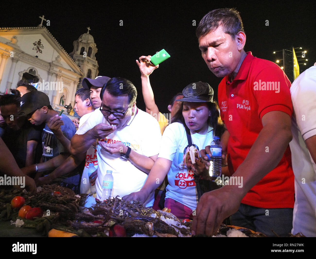 Former representative Neri Colmenares (L) and labor leader Leody de Guzman (R) seen participating in the boodle fight during the rally. 'Labor Win' a coalition of labor leaders running for Senate, said they are the only ones who have the 'real' credentials to push for pro-poor policies unlike other candidates for this year elections. the policial party 'Partido ng Lakas ng Masa' offers themselves as alternatives in this year's elections. They say they don't belong to either the administration or opposition Stock Photo