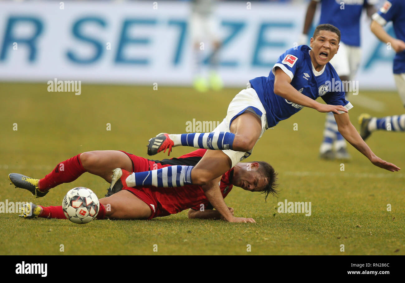 Amine Harit of Schalke 04, right, and Freiburg's Amir Abrashi are seen in action during the German Bundesliga soccer match between FC Schalke 04 and SC Freiburg at Veltins- Arena, Gelsenkrchen. ( Final score; SC Freiburg 0:0 FC Schalke 04 ) Stock Photo