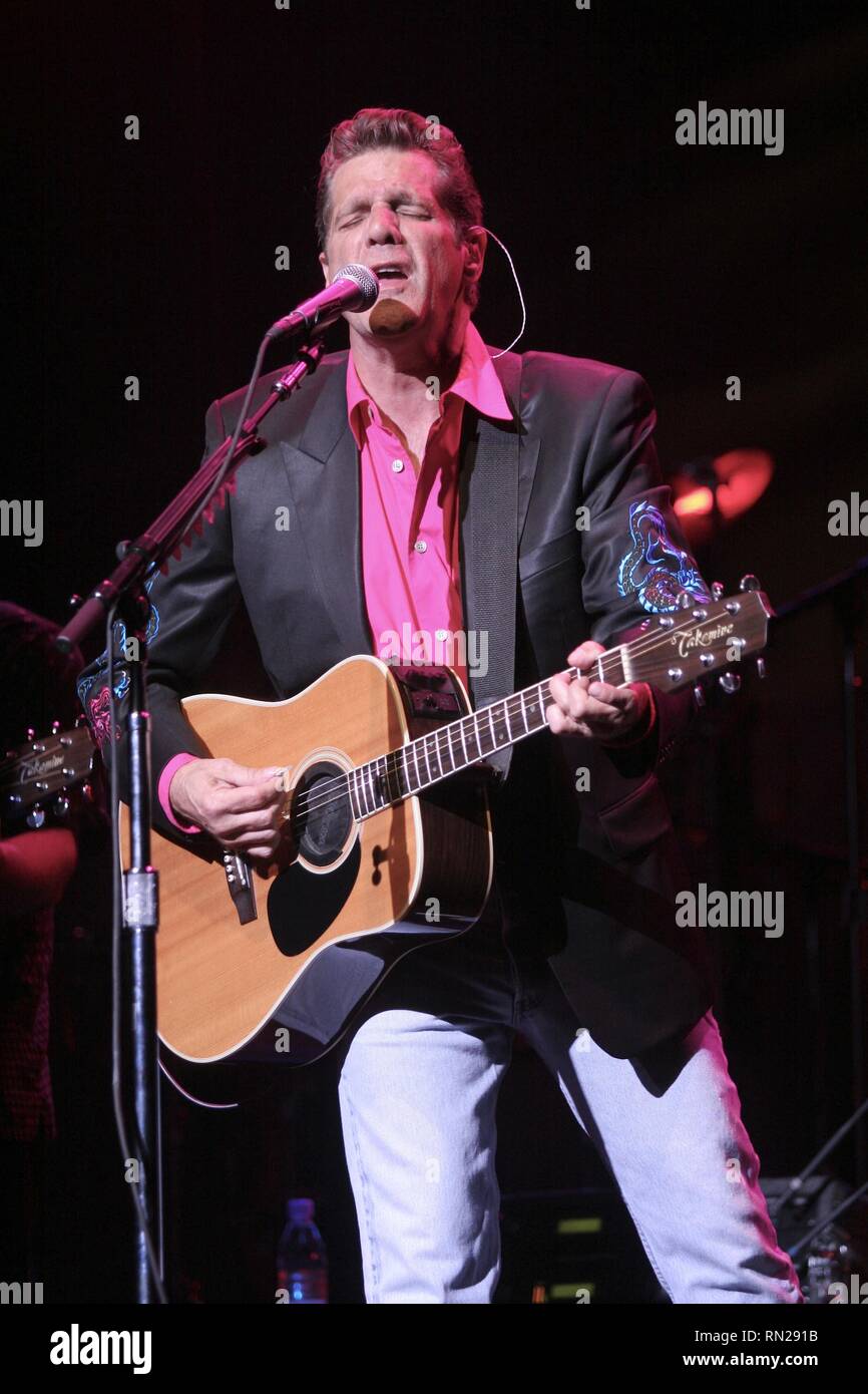 Musician, singer, songwriter, and actor, Glenn Frey, best known as one of  the founding members of the Eagles, is shown performing on stage with his  solo band Stock Photo - Alamy
