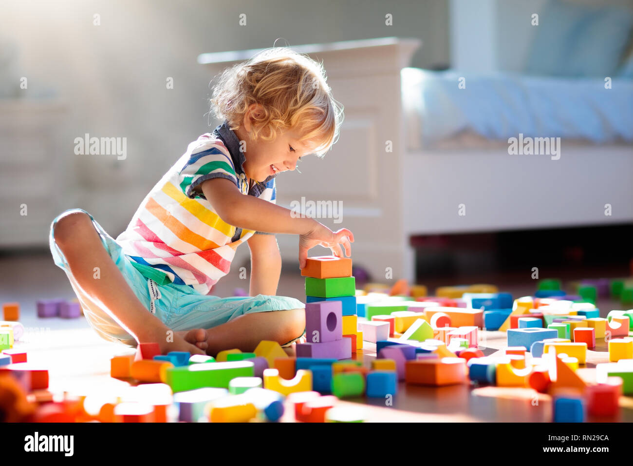 kid playing blocks