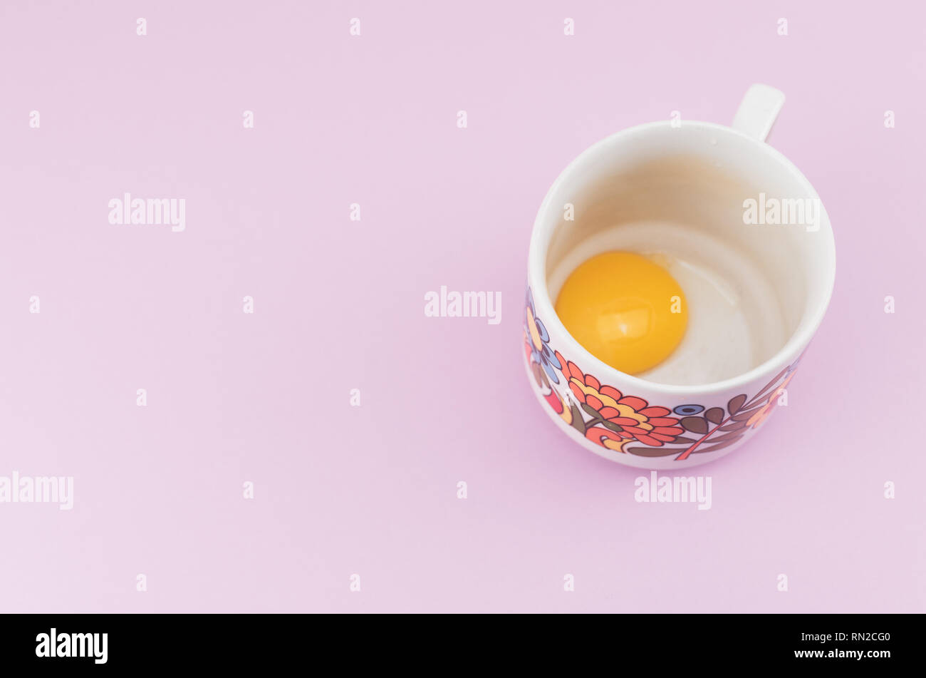 White Empty Broken Egg Shell And Egg Yolk In A Cup Stock Photo Alamy