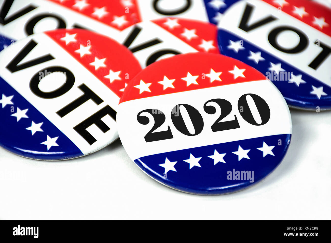 close up of political voting pins for 2020 election on white Stock Photo