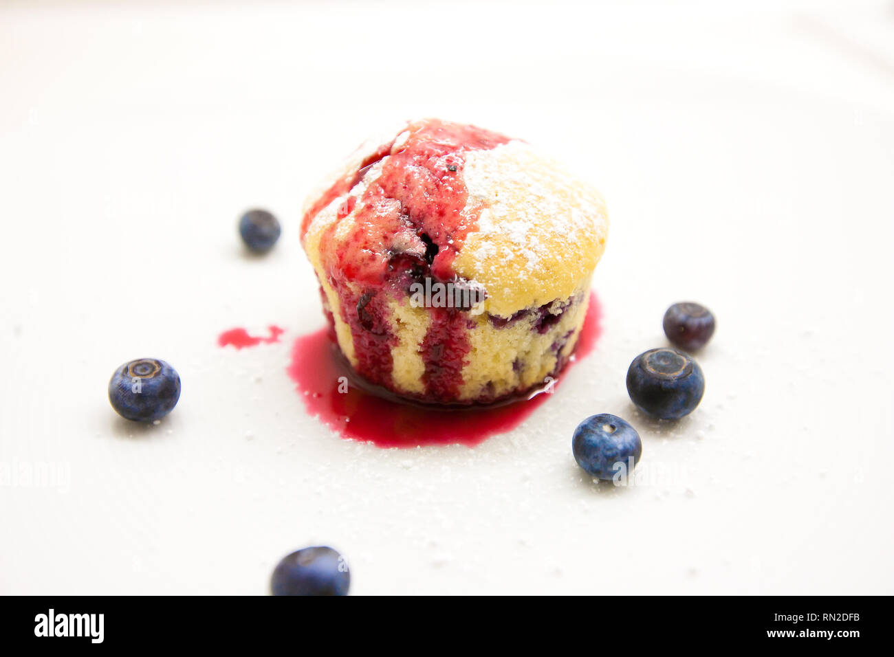Tasty blueberry muffin isolated on a white background Stock Photo