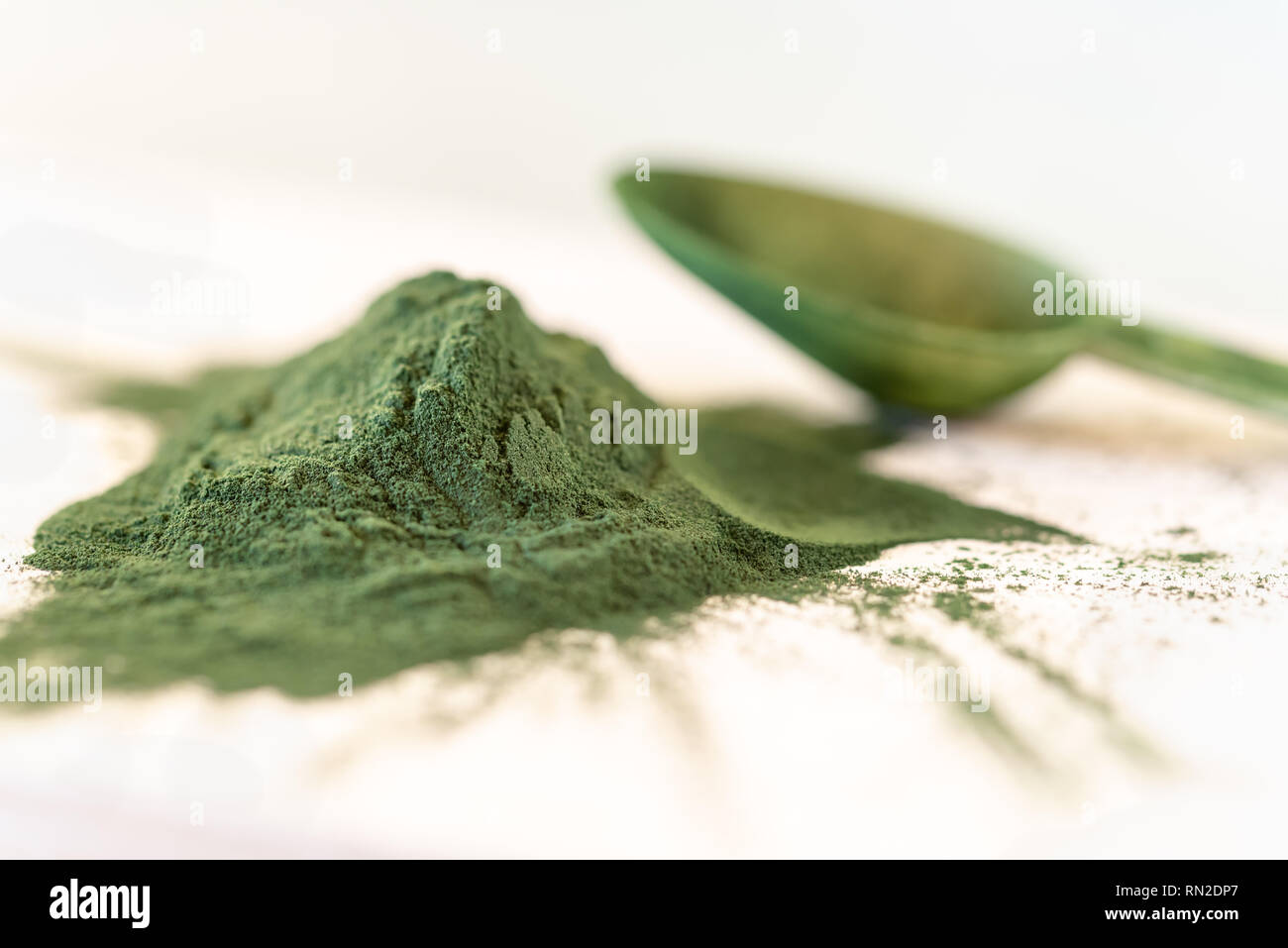 Green Spirulina algae powder, healthy dietary supplement on wooden board Stock Photo Alamy