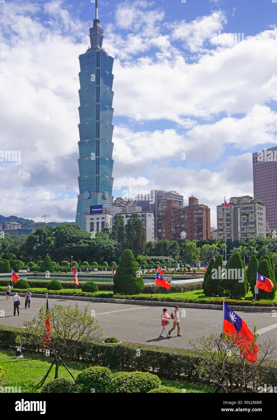 Taipei 101 building seen from Sun Yat-sen Memorial Hall decorated with Republic of China flags. Stock Photo