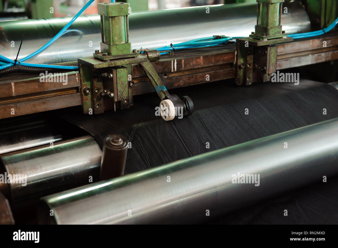 The process of rolling rubber Stock Photo Alamy