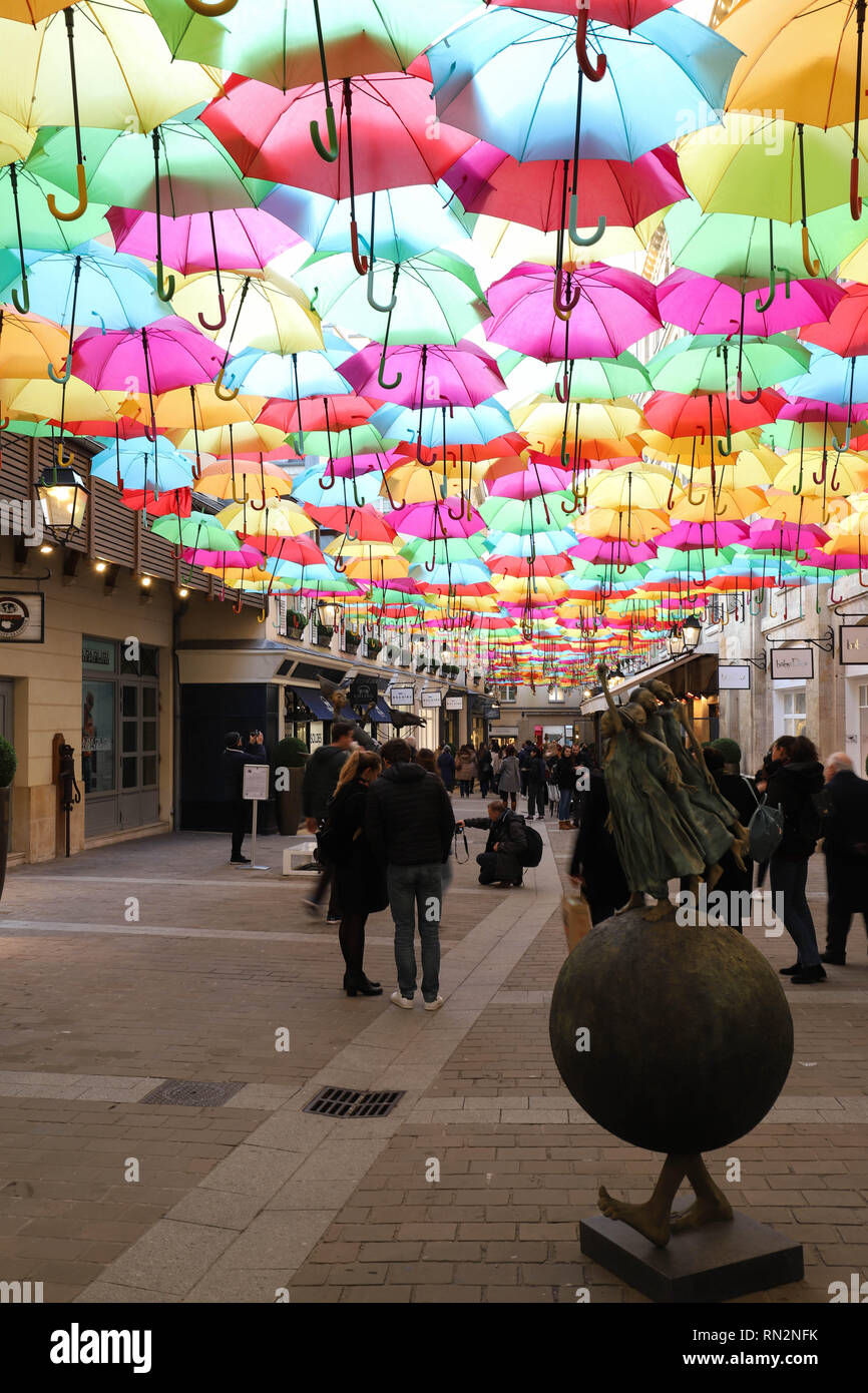 View of Royal Village decorated with umbrellas. It is located near  Madeleine in 8th district. Paris. France Stock Photo - Alamy