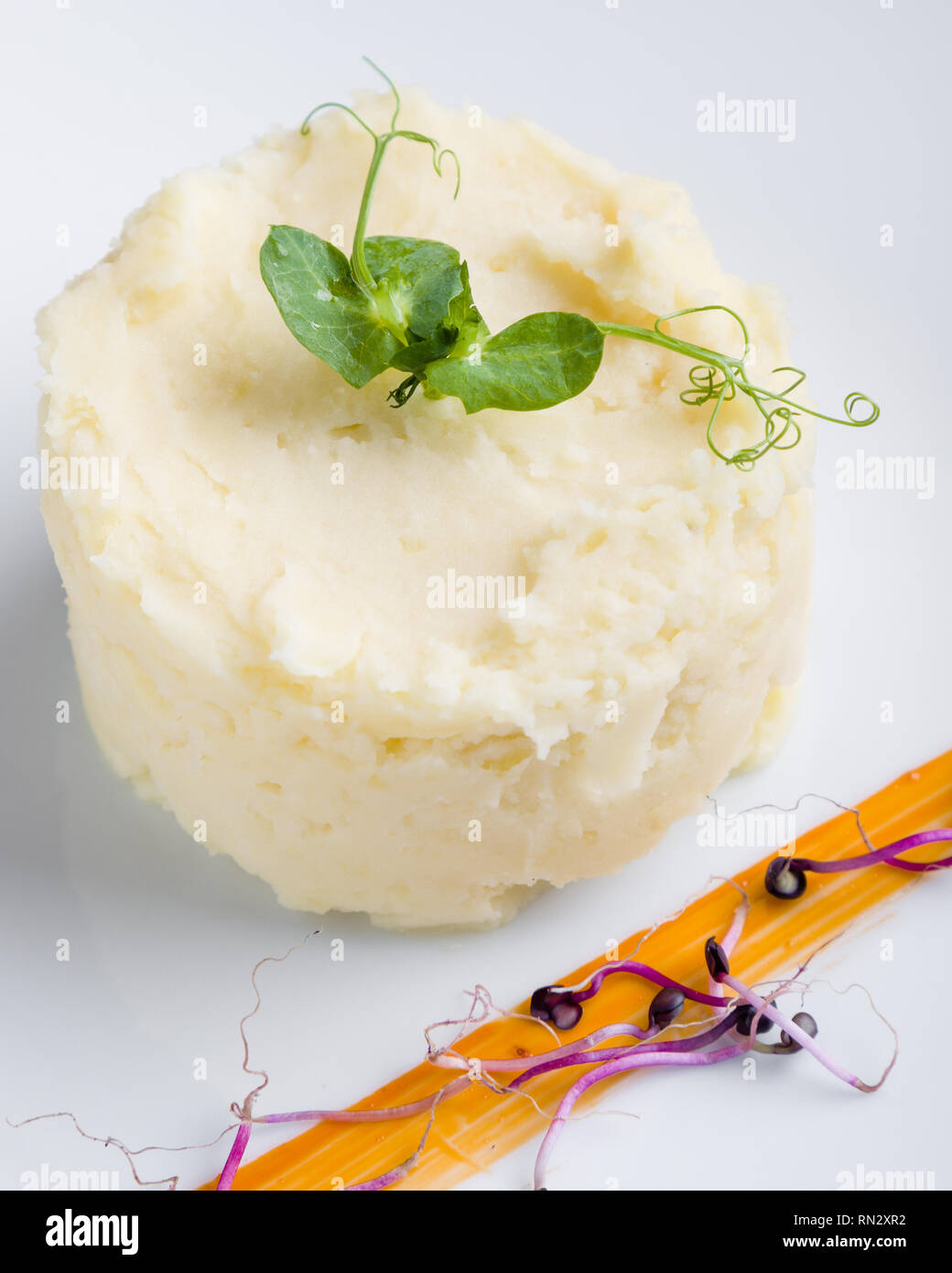 fresh mashed potato portion on white plate Stock Photo