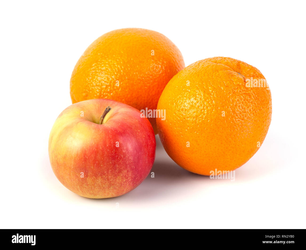 Apples and orange on white background, healthy diet Stock Photo - Alamy