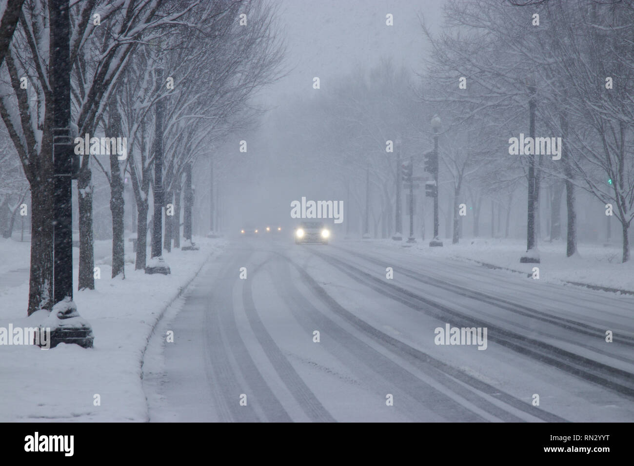 Car traffic on Independence Avenue in snow Washington DC USA Stock