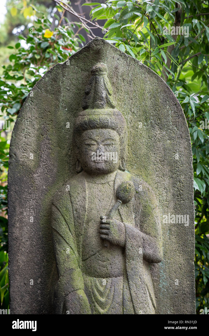 Stone fihures at the Sengakuji Temple, Tokyo, Japan Stock Photo