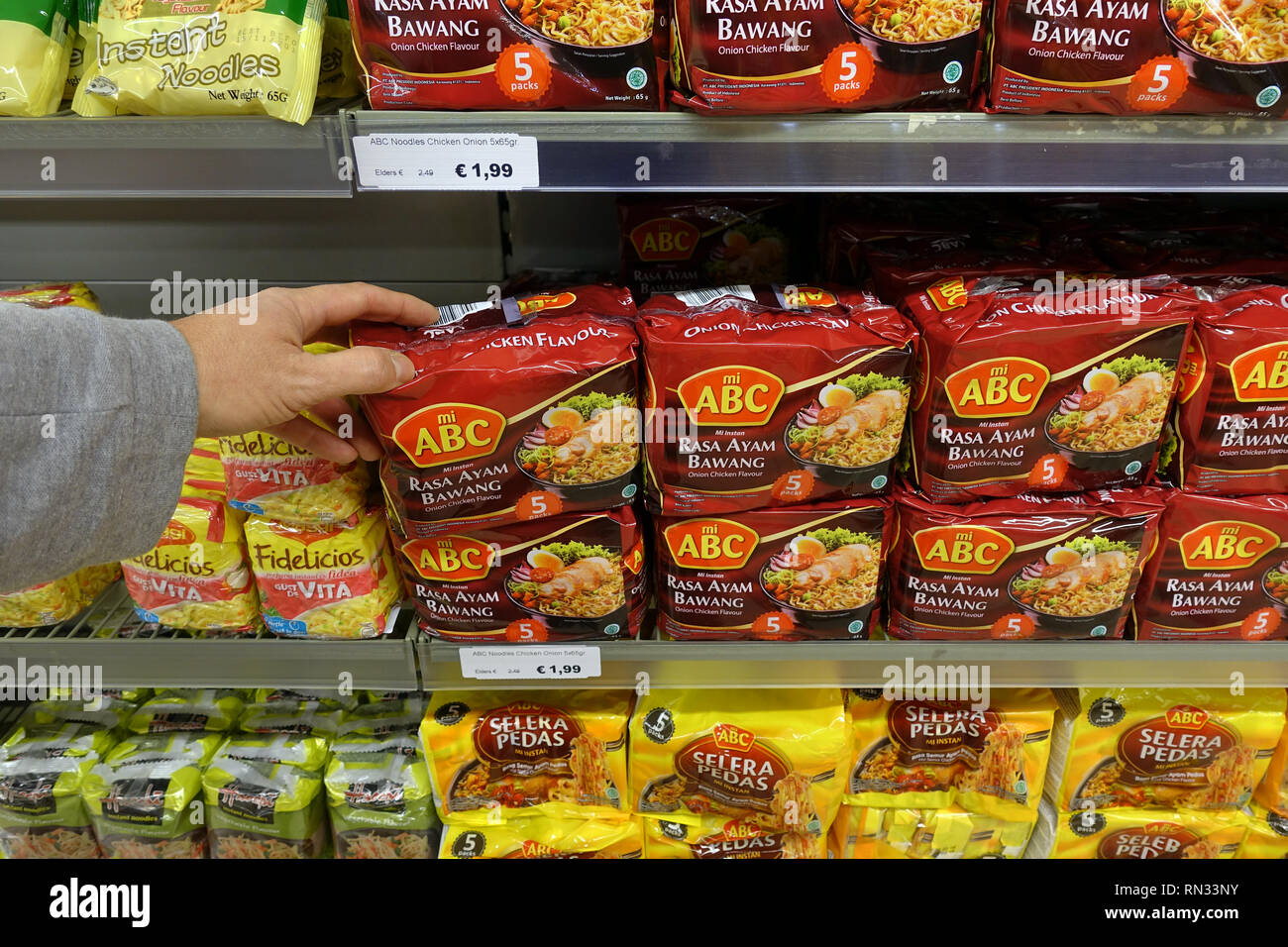 Shelves with instant soups and noodles in a store Stock Photo