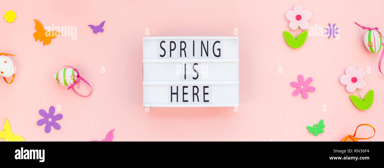Creative Top view flat lay holiday composition Easter text Spring is ...