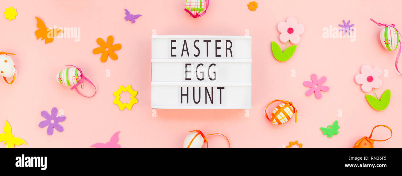 Creative Top view flat lay holiday composition Easter egg hunt text on ...