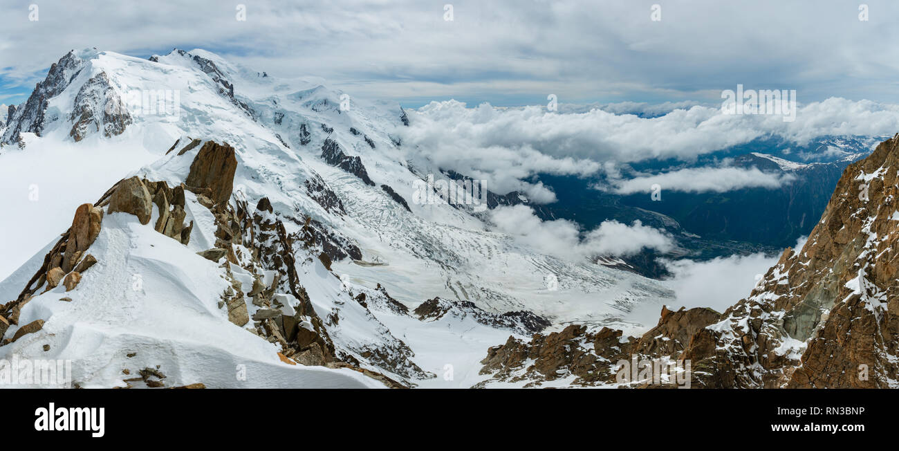 Mont Blanc rocky mountain massif summer view from Aiguille du Midi Mount, Chamonix, French Alps Stock Photo