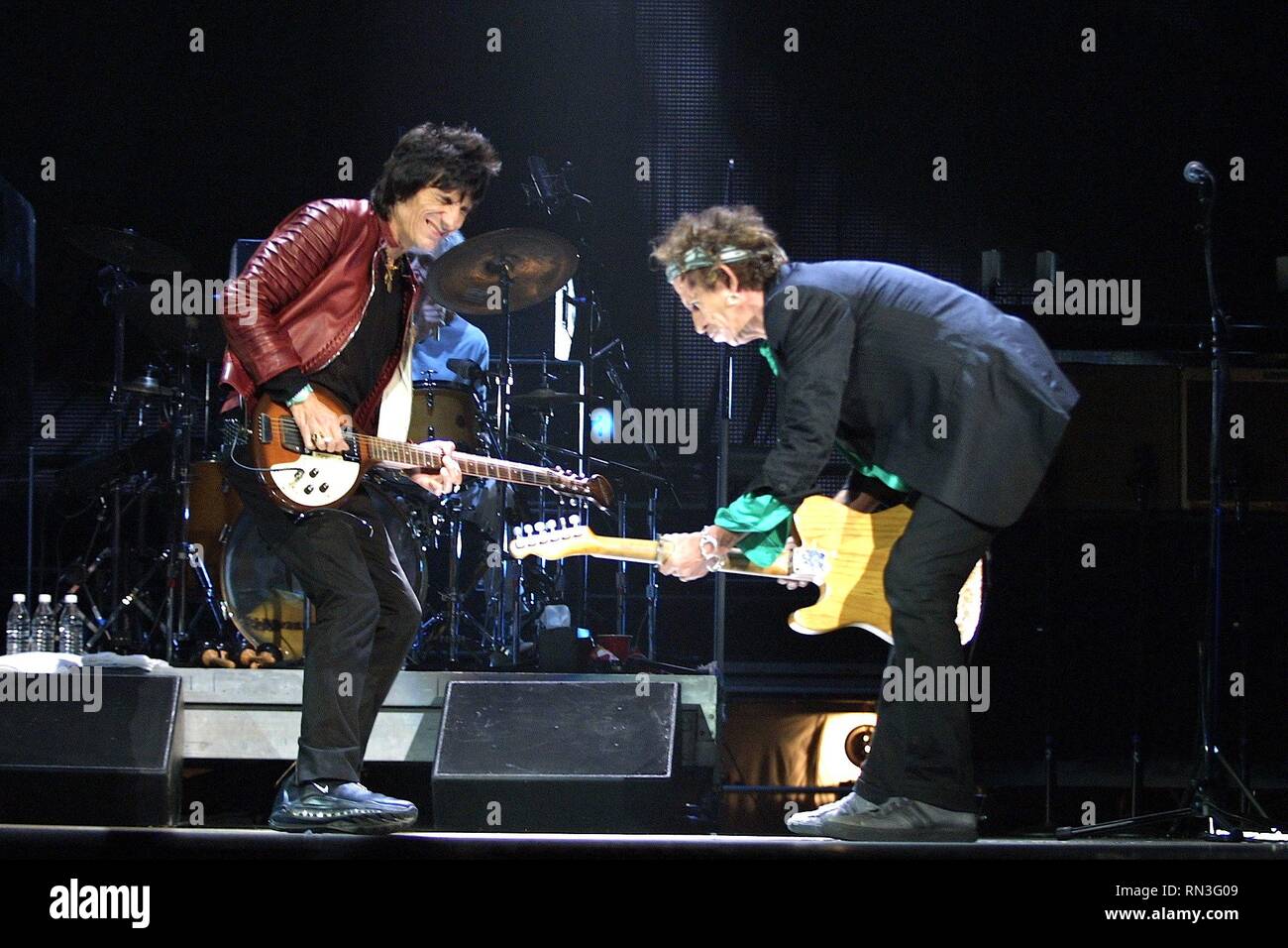 Guitarists Ron Wood and Keith Richards of the Rolling Stones are shown performing on stage during a 'live' concert appearance. Stock Photo
