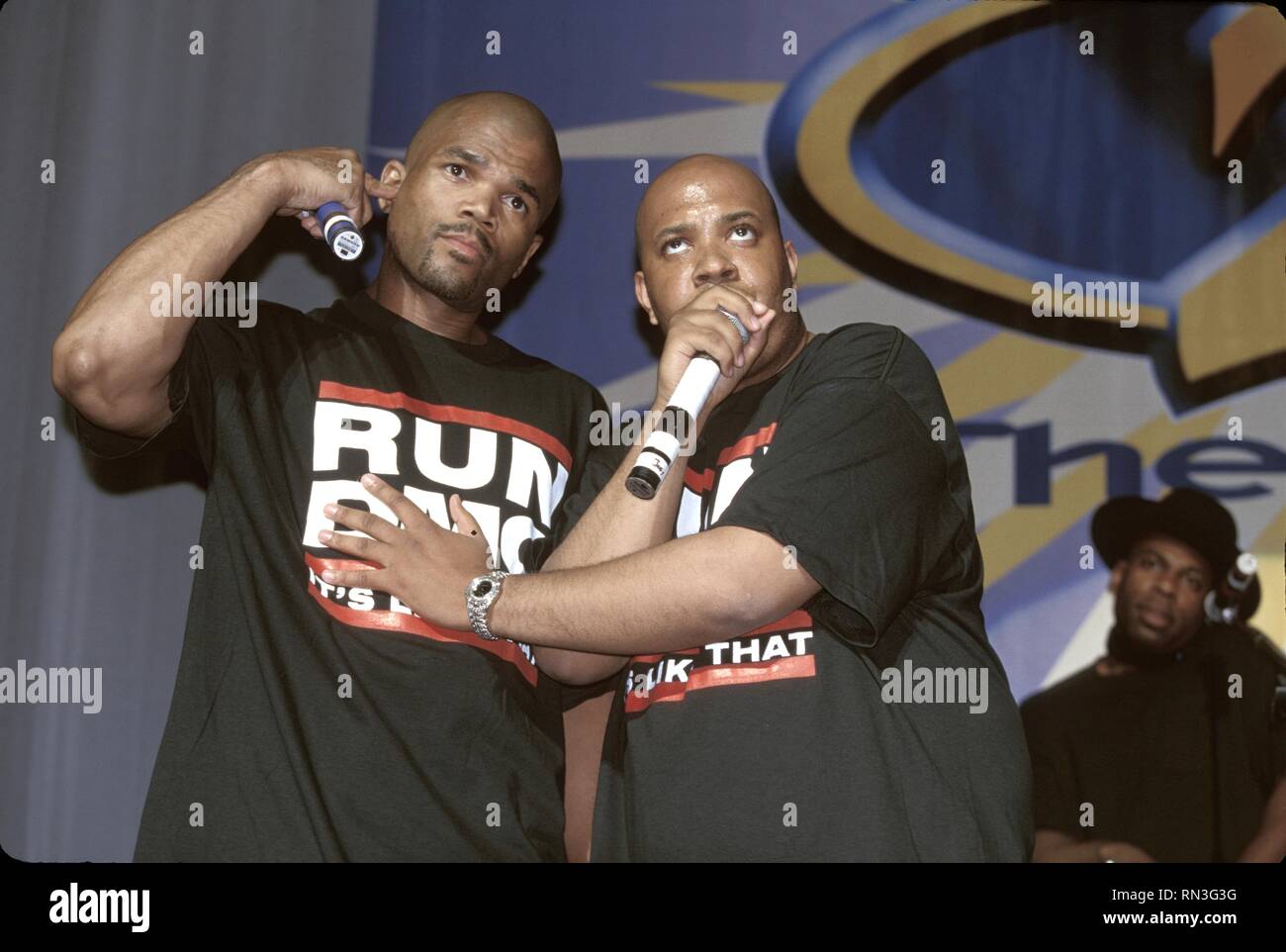 Run DMC.are shown performing on stage during a "live" concert