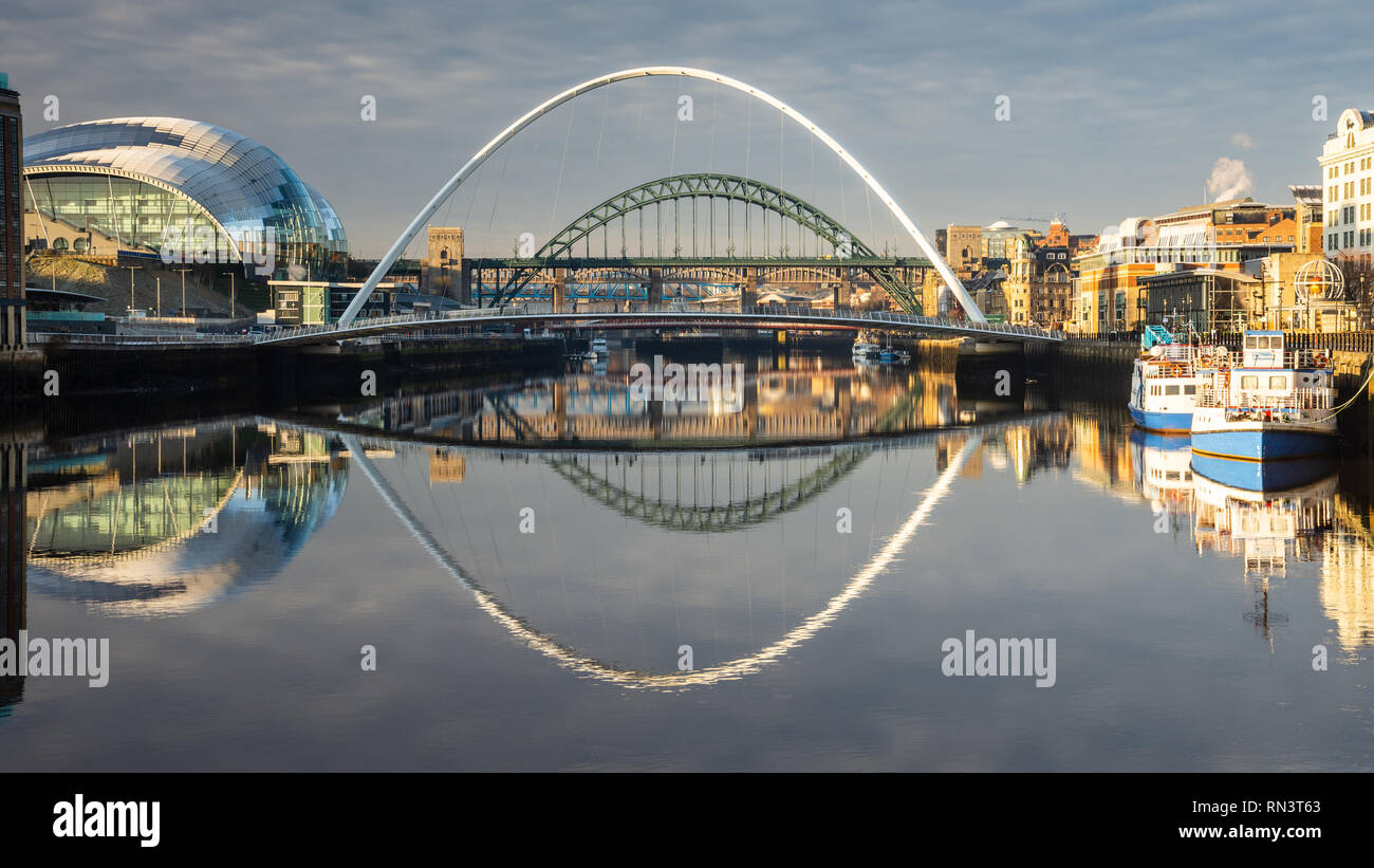 Gateshead, England, UK - February 5, 2019: Morning light illuminates the quaysides and bridges of Newcastle and Gateshead. Stock Photo