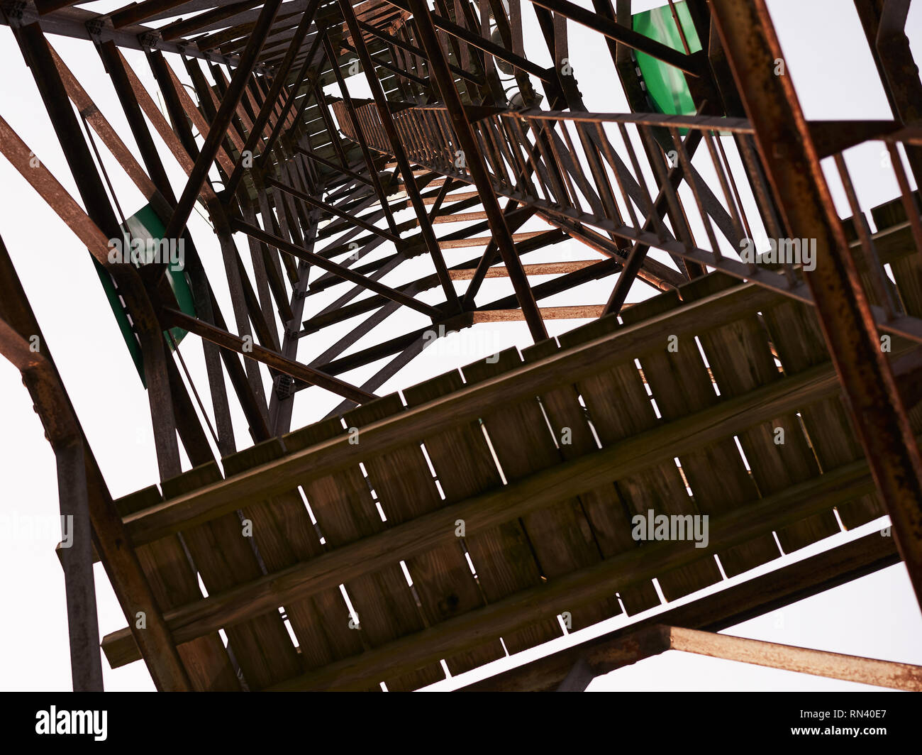 standing directly under wooden structure, looking up Stock Photo