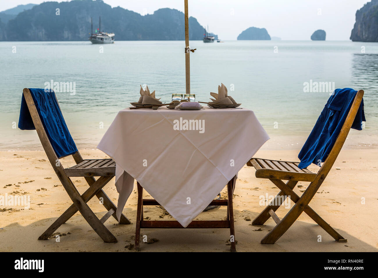 Dining table on beach in Halong Bay, Vietnam Stock Photo Alamy
