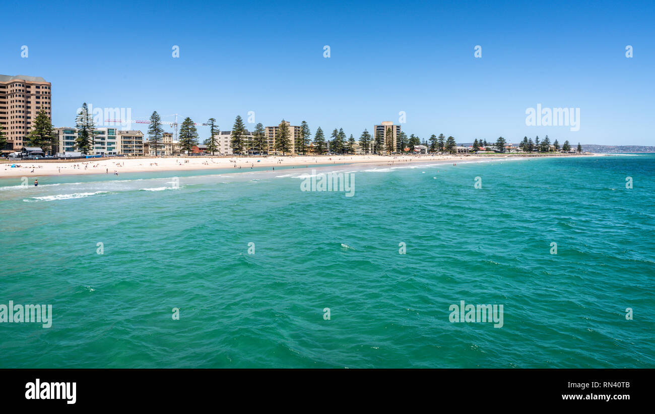 Distant view of Glenelg beach in Adelaide suburb on hot sunny summer day in South Australia Stock Photo