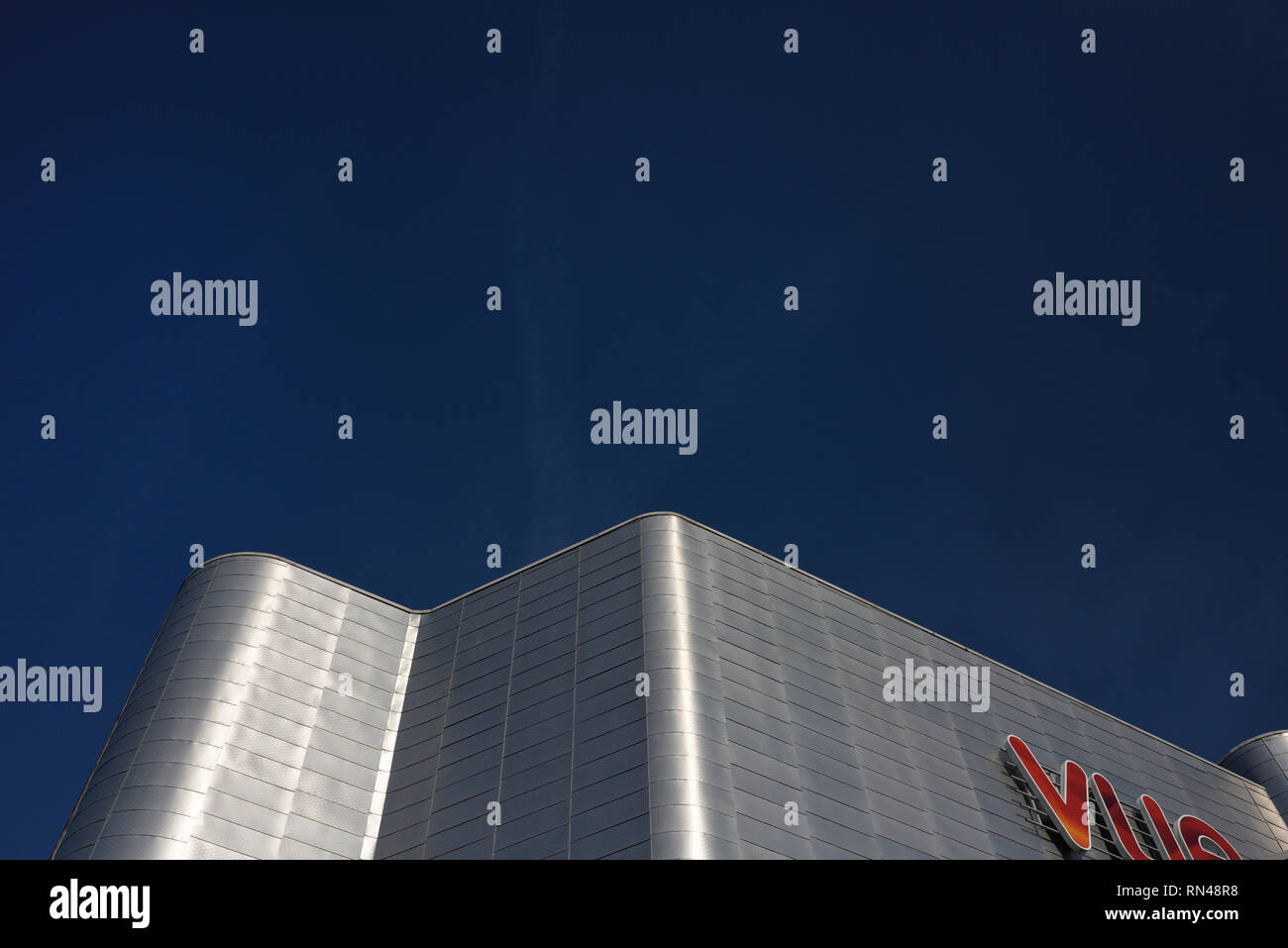 Modern building exterior with aluminium rainscreen cladding, sunlight ...